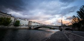 river Seine in Paris with bridge at dawn